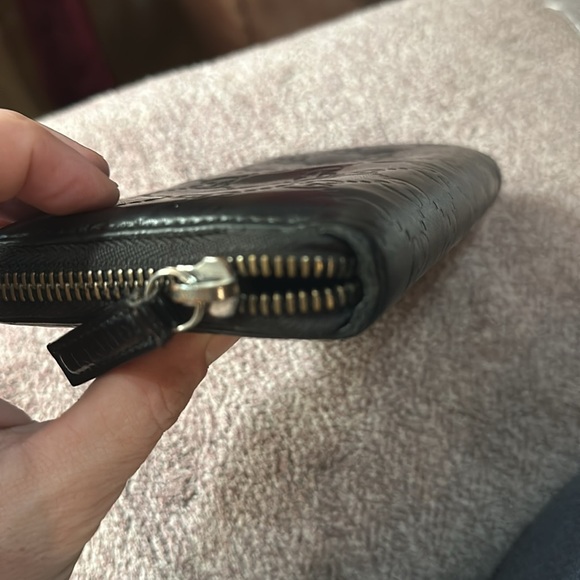 Gucci black wallet.  Gently used.  In GREAT condition.  Zippers work.  Black! - Picture 3 of 7